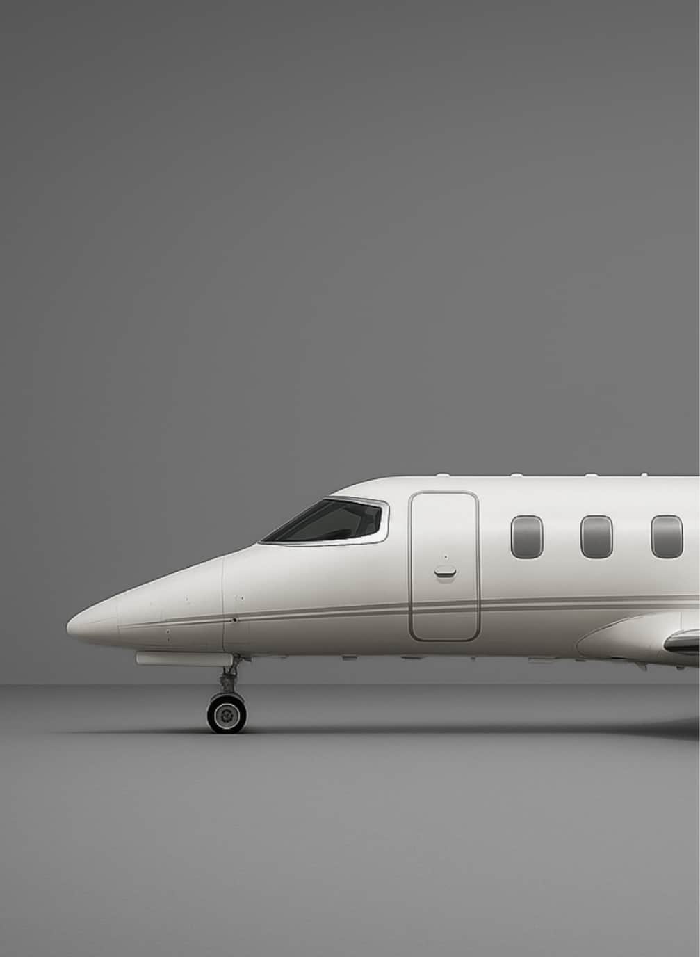 Flugzeug vor grauem Hintergrund